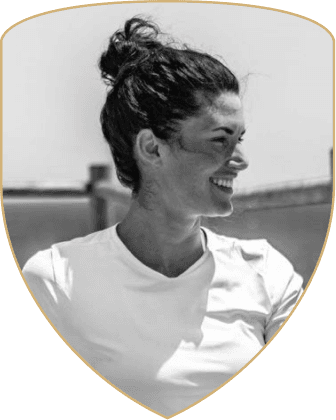 Kat Alhers, framed by the Guild crest shield